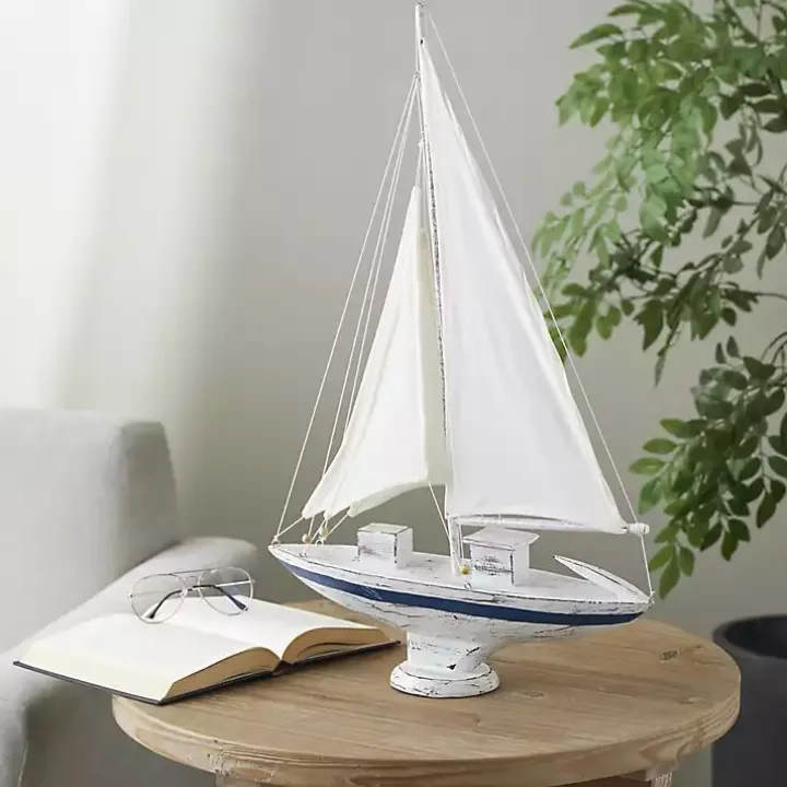 Coastal White and Blue Sailboat Statue