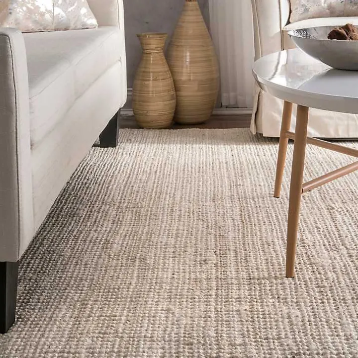 Neely Solid Jute Area Rug, 5x8