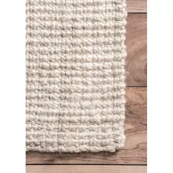 Neely Solid Jute Area Rug, 5x8