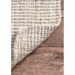 Neely Solid Jute Area Rug, 5x8