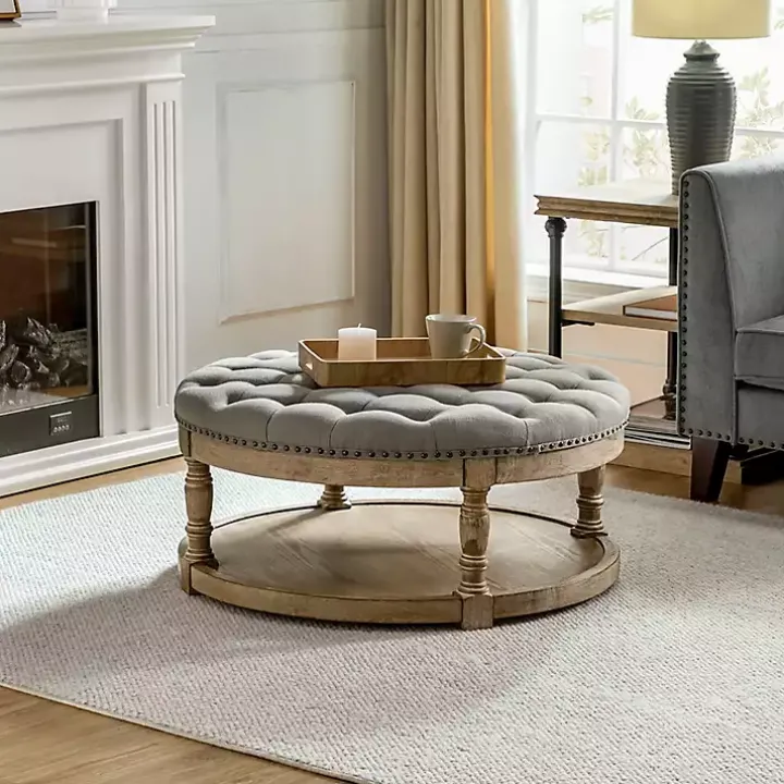 Round Gray Cepheus Tufted Ottoman